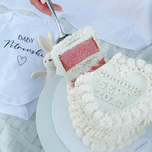 Load image into Gallery viewer, Heart shaped gender reveal cake sliced to reveal pink centre inside