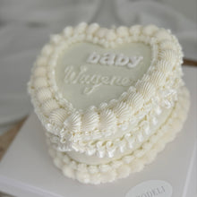 Load image into Gallery viewer, Heart shaped gender reveal cake with piped buttercream border by Spodeli