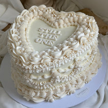 Load image into Gallery viewer, Heart shaped vintage Lambeth style cake with detailed white piping and pearl finish