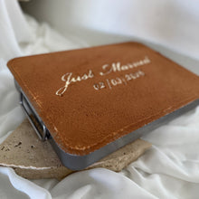 Load image into Gallery viewer, tiramisu with 'Just Married' dusting on a white fabric background