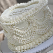 Load image into Gallery viewer, Side profile of vintage wedding cake showing layered buttercream piping and pearl texture