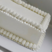 Load image into Gallery viewer, Long table cake with piped buttercream finish on a rectangular cake
