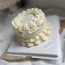 Load image into Gallery viewer, Mini round gender reveal cake with piped buttercream sides