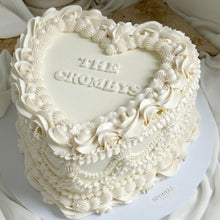 Load image into Gallery viewer, White vintage pearl wedding cake in heart shape with piped buttercream and edible pearls