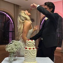 Load image into Gallery viewer, Bride and groom cutting a two tier vintage pearl wedding cake by Spodeli Newcastle