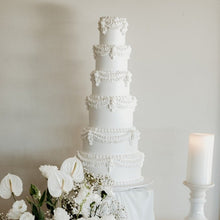 Load image into Gallery viewer, Elegant multi-tier wedding tower cake with ornate buttercream detailing