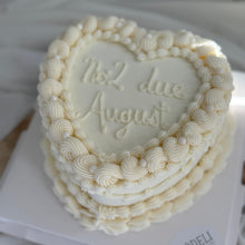 Load image into Gallery viewer, 6 inch heart gender reveal cake with piped buttercream and message on top
