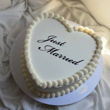 Load image into Gallery viewer, Just Married Heart shaped all white with black writing
