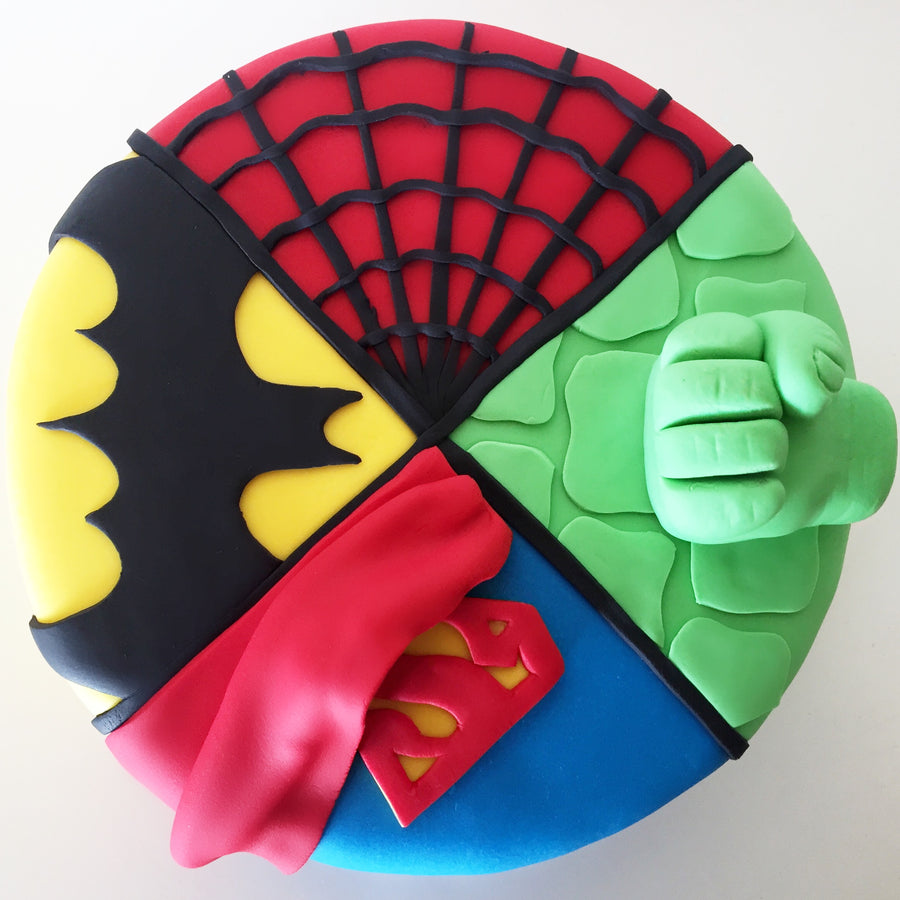 Comic-style superhero cake featuring Batman, Spider-Man, Hulk and Superman inspired sections