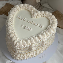 Load image into Gallery viewer, Custom message on heart shaped vintage wedding cake with piped buttercream border
