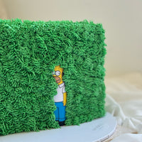 Custom Homer Simpson hedge meme cake with textured green buttercream