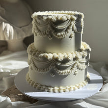 Load image into Gallery viewer, Luxury two tier vintage pearl wedding cake with ornate piping in white on white design
