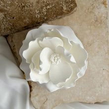 Load image into Gallery viewer, Top view of Magnolia Mini Cake from Spodeli Mini Series with layered sculpted petals on marble surface
