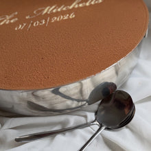 Load image into Gallery viewer, Round tiramisu cake with smooth cocoa finish and custom wedding writing on top
