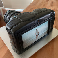 Rear view of a camera cake featuring a detailed screen and button layout