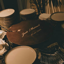 Load image into Gallery viewer, Tiramisu dessert cake styled on a wedding table surrounded by plates and warm lighting at Peregrin Merewether
