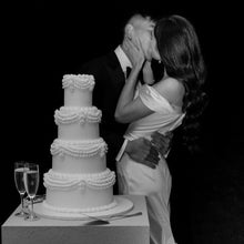 Load image into Gallery viewer, cake moment sealed with a kiss during a cake cutting celebration
