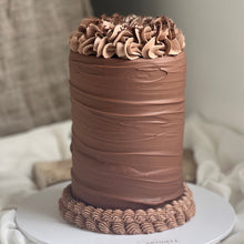 Load image into Gallery viewer, Chocolate lovers cake finished with layered chocolate buttercream and piped chocolate topping
